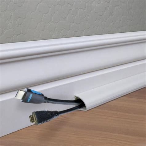 decorative electric box at baseboard|hide cords over baseboard.